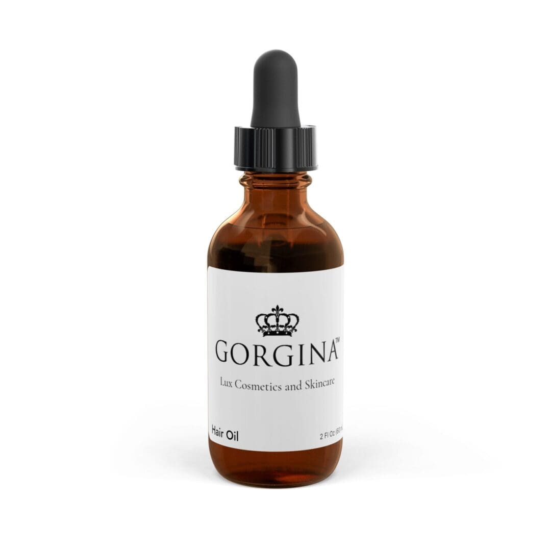 A 2oz brown glass dropper bottle labeled "Hair Oil" from Gorgina Lux Cosmetics and Skincare, featuring a white label and black cap.