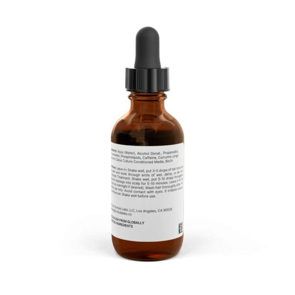 Hair Growth Tonic in a 2oz brown glass dropper bottle with a white label displaying text and ingredient information.