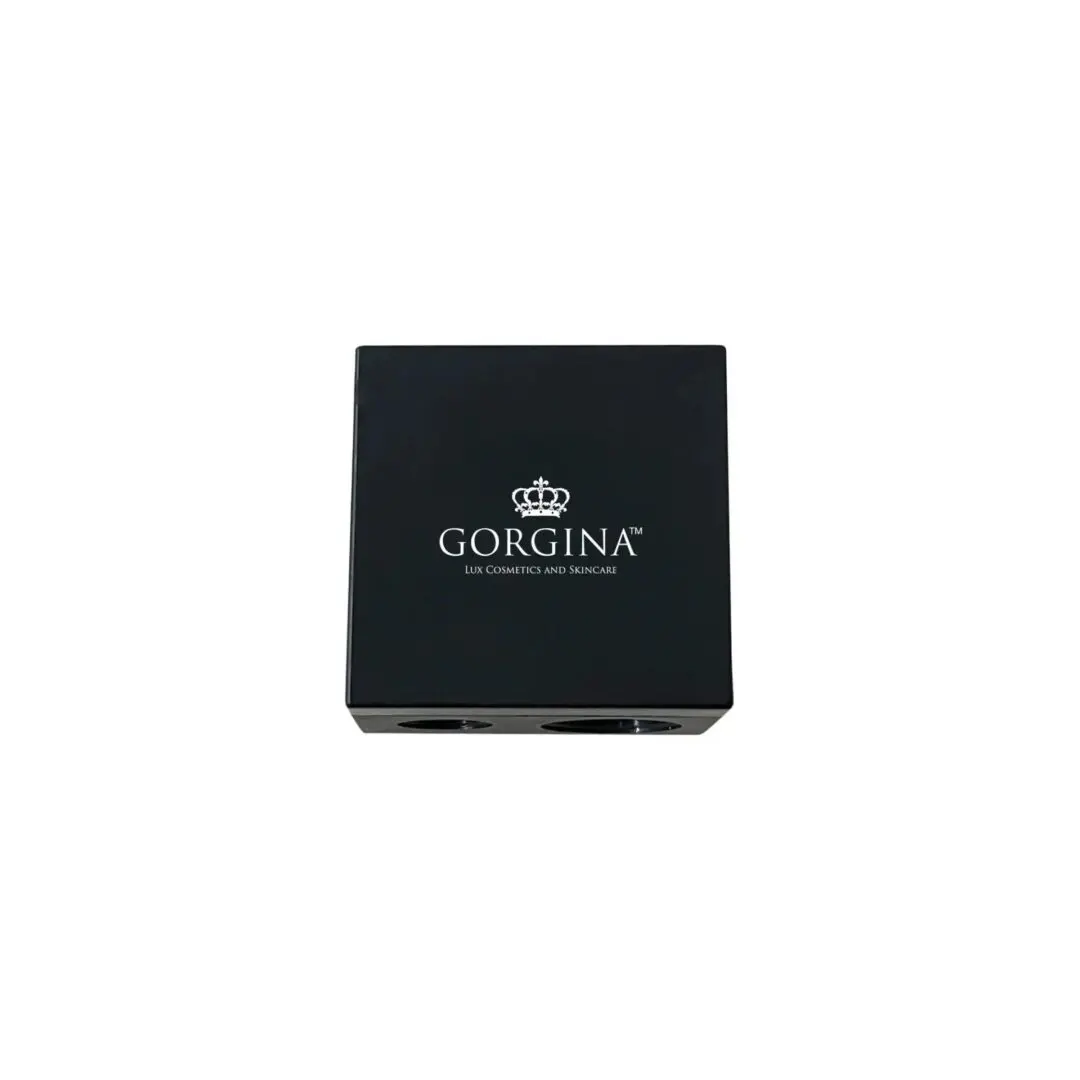 Black Gorgina Lux Cosmetics and Skincare box with a crown logo on the lid, placed against a white background.