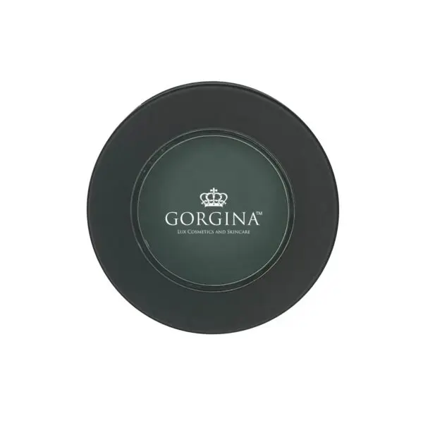 A round black container labeled "Gorgina Lux Cosmetics and Skincare" with a crown logo.