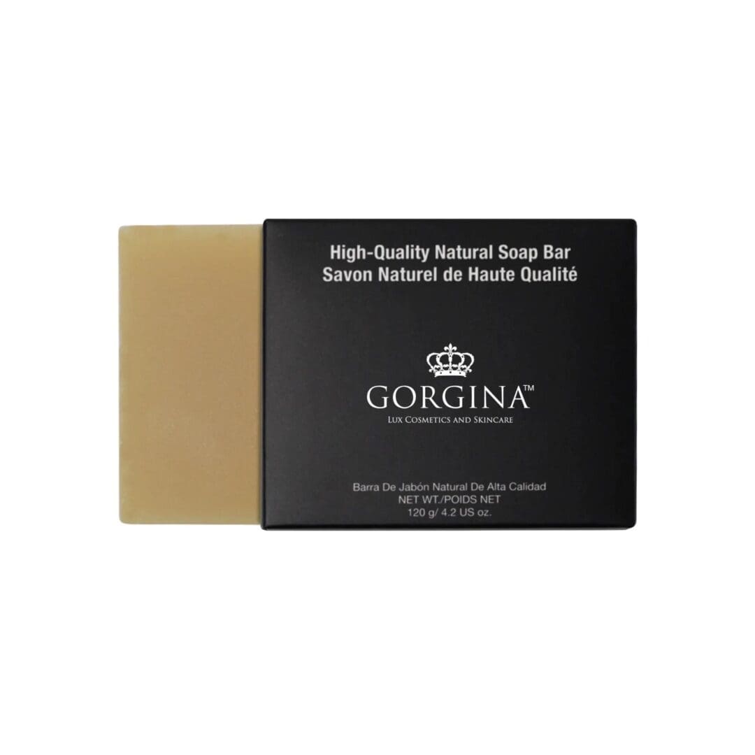 A bar of soap partially wrapped in black packaging labeled "Gorgina Lux Cosmetics and Skincare.