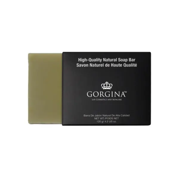 A green soap bar partially out of its black packaging labeled "Gorgina" with details in English and Spanish.