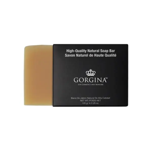 A beige soap bar with black packaging labeled "Gorgina, High-Quality Natural Soap Bar," in English, French, and Spanish. Net weight: 120g/4.2 oz.