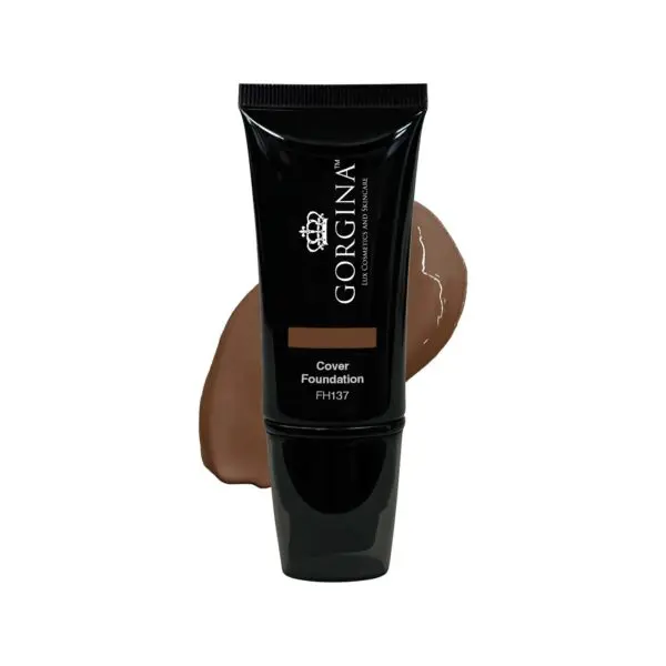 A black tube of Gorgina Cover Foundation FH137 with a beige smear of the product displayed in the background.