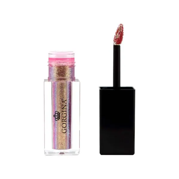 A bottle of metallic pink and gold lip gloss with an applicator wand placed beside it.