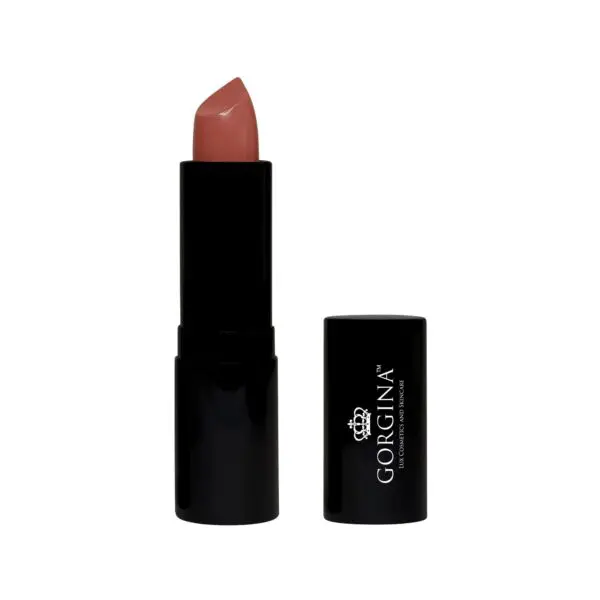 A tube of Gorgina lipstick in a natural pink shade with the cap removed and placed beside it.