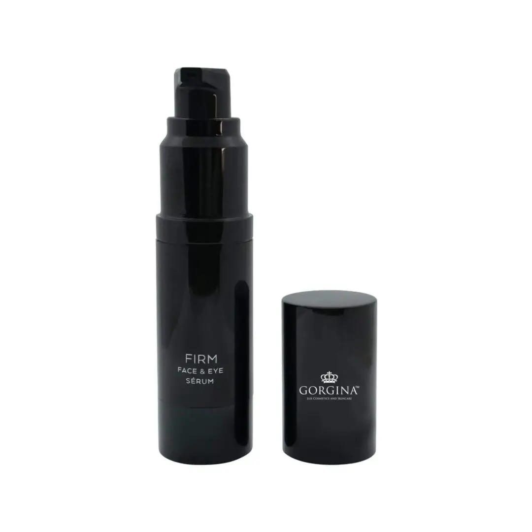 A black bottle of Firm Face & Eye Serum with a black cap beside it.