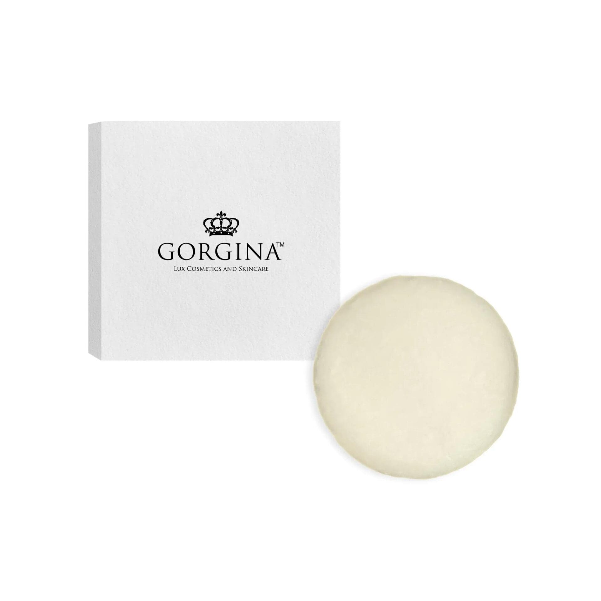 A round, white soap bar displayed beside a white box labeled "Gorgina Lux Cosmetics and Skincare.