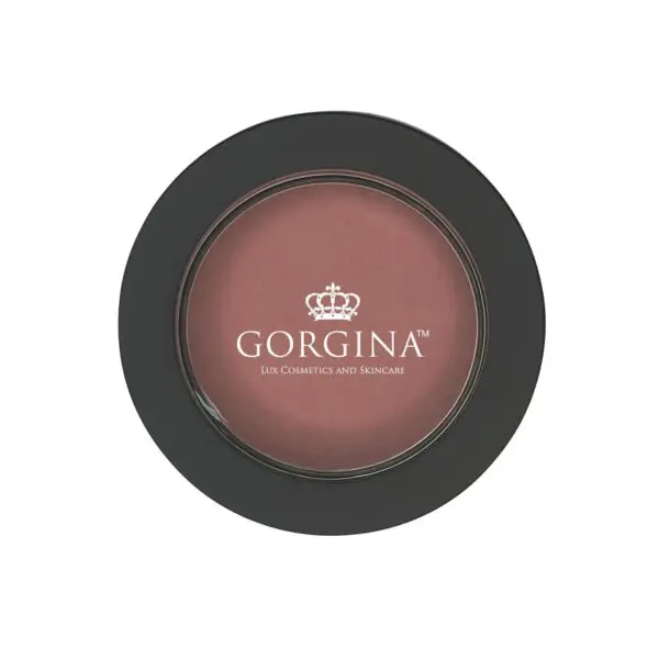 A round container of blush from Gorgina Lux Cosmetics and Skincare with a black rim and a crown logo on the lid.