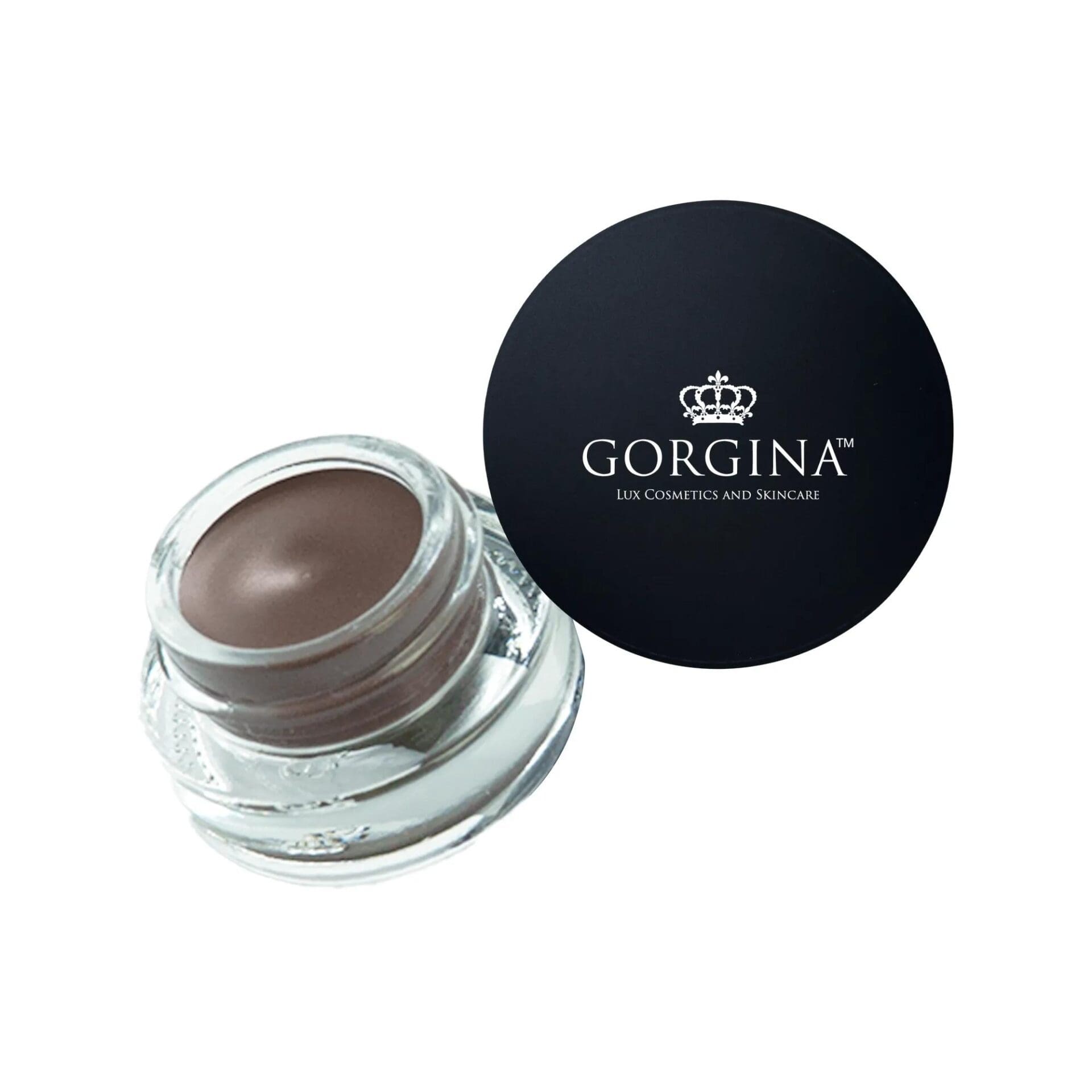 A small glass jar of brown cream makeup with a black lid labeled "Gorgina Lux Cosmetics and Skincare.