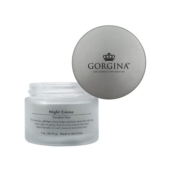 A jar of Gorgina Lux Cosmetics and Skincare Night Crème with the lid off, showing the product label and open container.