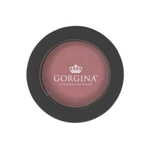 A round black compact containing mauve powder blush with the brand name "Gorgina Lux Cosmetics and Skincare" printed on the clear lid.