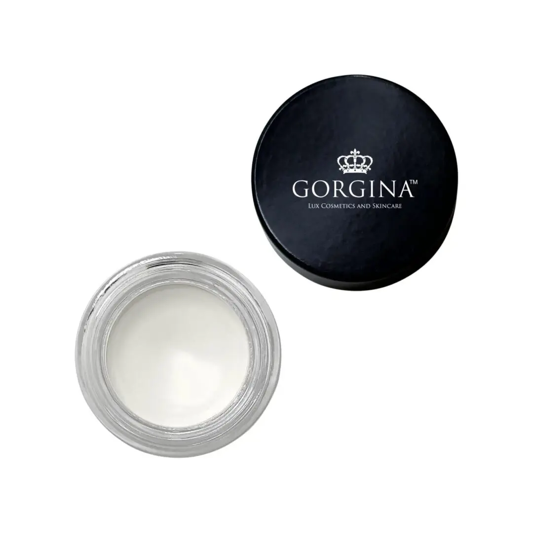 An open jar of clear cream with a black lid labeled "Gorgina Lux Cosmetics and Skincare" placed beside it.