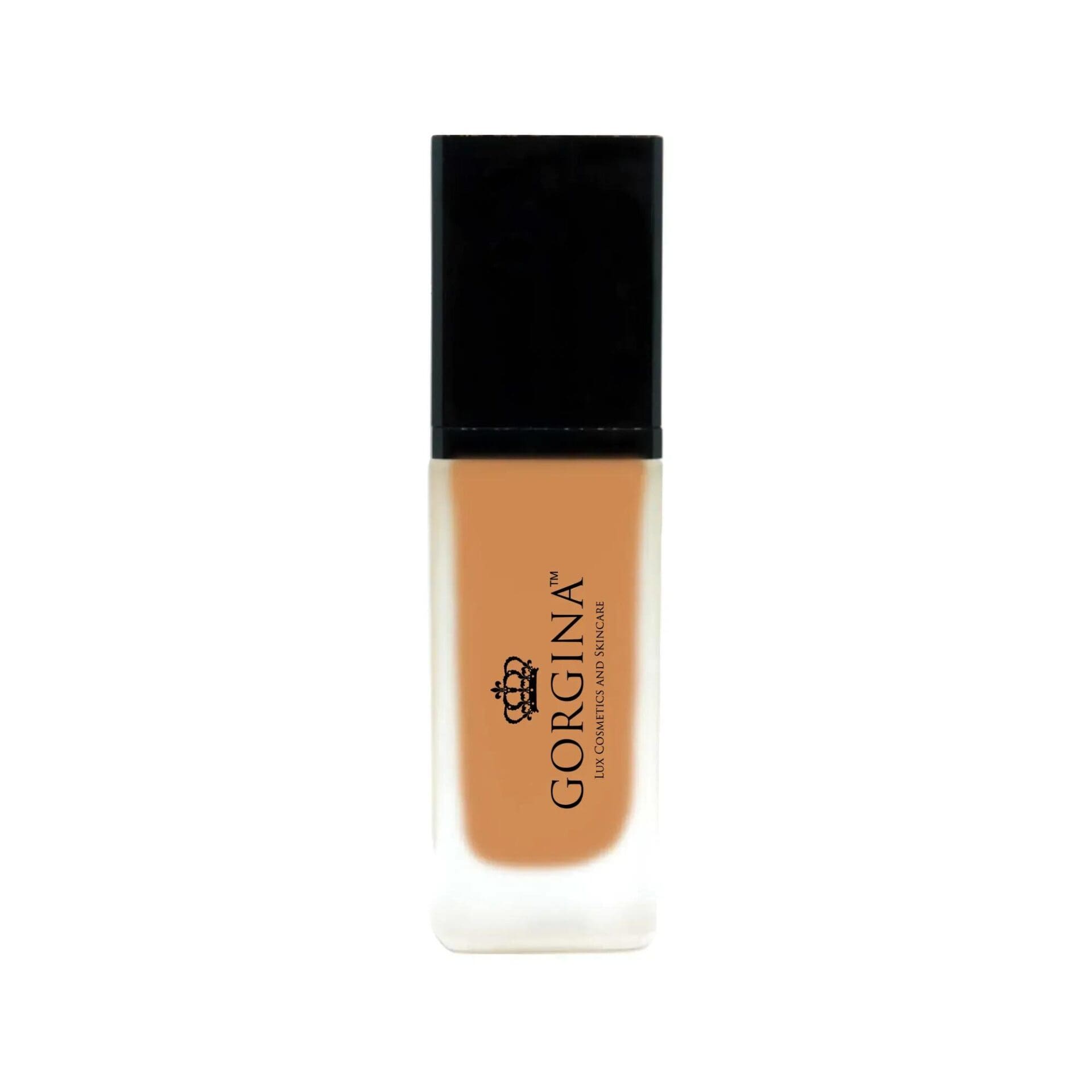 A rectangular bottle of Gorgina liquid foundation with a black cap and beige makeup visible inside. The label features the brand name and logo.