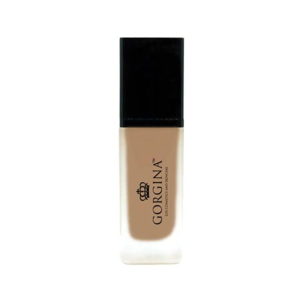 A frosted glass bottle with a black cap contains Gorgina liquid foundation, featuring the brand logo and text on the front.