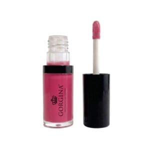 A pink liquid lipstick with the brand name "Gorgina" on the bottle; the applicator wand is placed next to the open container.