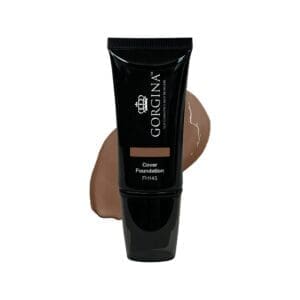 A black tube of Gorgina Cover Foundation FH145 is displayed in front of a swatch of medium-dark foundation on a white background.