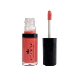 A tube of Gorgina lip gloss with the applicator wand removed and standing upright beside the open container, displaying a peach-pink gloss color.